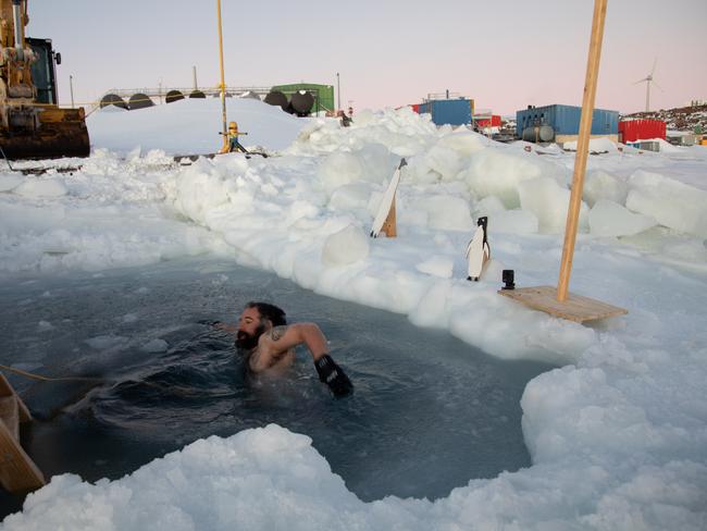 Bureau of Meteorology engineer Leon Hamilton swimming laps to celebrate Midwinter. Picture: Troy Henderson.