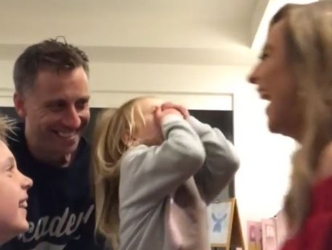 The family laughs after Evie asks if she's having twins.