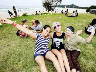 Byron Bay has enjoyed the company of a more discerning group of school leavers this year, at odds with the media hype surrounding the event. Pictured enjoying schoolies at Byron Bay this year are (from left) Sara Khan, 17, Alexis Jayne, 18, and Sarah Coffey, 18, all from Sydney. . Picture: Cathy Adams