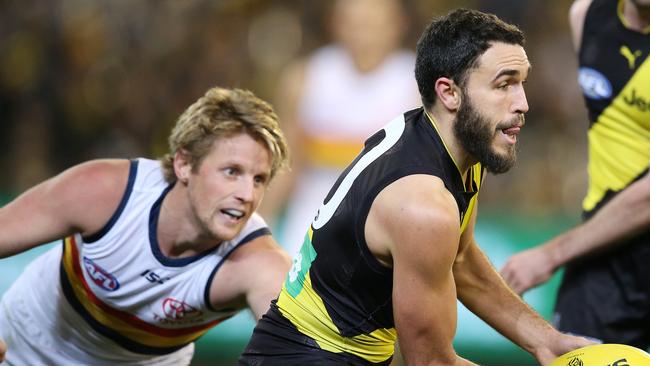 Rory Sloane tries to latch on to Richmond's Shane Edwards. Picture: Michael Klein