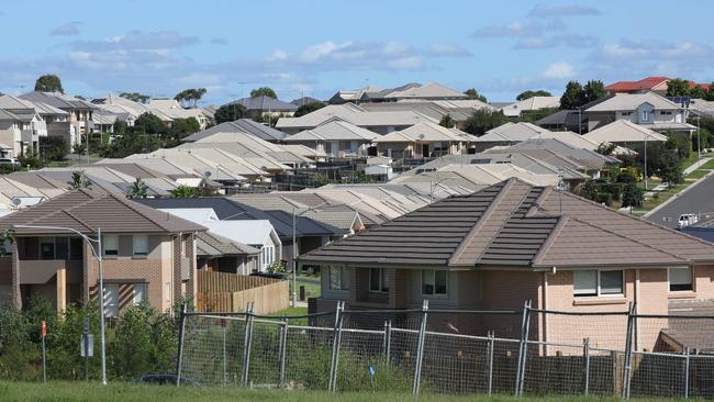 Pictures of the sea of houses at The Rydges in Elderslie as the population spreads south west at a rapid pace.