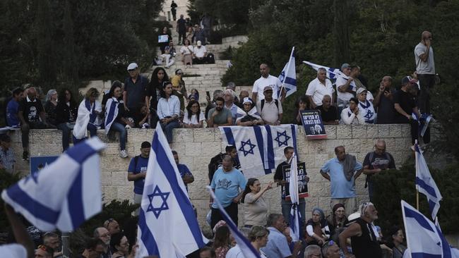 Israeli supporters of Benjamin Netanyahu at a rally outside the Knesset in Jerusalem on Thursday. Picture: Mahmoud Illean/AP