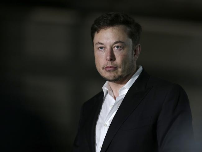 FILE- In this June 14, 2018, file photo, Tesla CEO and founder of the Boring Company Elon Musk speaks at a news conference in Chicago. Tesla is suing a former employee at its Nevada battery factory alleging that he hacked into the manufacturing computers and disclosed confidential trade secrets. The federal lawsuit filed Wednesday, June 20, contends that Martin Tripp of Sparks, Nev., also made false claims to the media about information he stole, including claims that the company used punctured battery cells in the Model 3 electric car. (AP Photo/Kiichiro Sato)