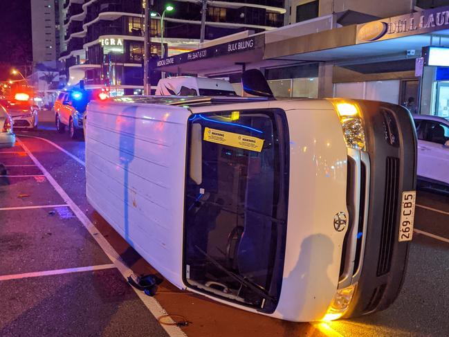 A stolen van lies on its side after being crashed at Nind St in Southport earlier this month. Picture: Keith Woods.