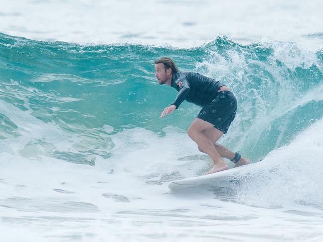 Simon Baker is a keen surfer. Picture: DIIMEX.COM