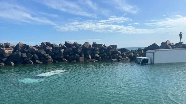 Two cars and a truck were pulled from Nightcliff Jetty after being completely submerged by the high tide on Monday August 5.