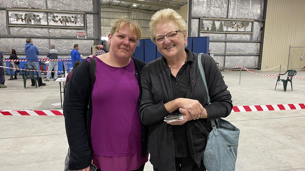 Susan Anderson and her mum Robyn Anderson wait in line to receive the Pfizer vaccine at the Stanthorpe Covid clinic. Photo: Madison Mifsud-Ure / Stanthorpe Border Post