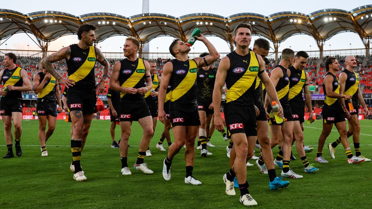 GOLD COAST, AUSTRALIA - MARCH 09: Richmond are seen leaving the field during the 2024 AFL Opening Round match between the Gold Coast SUNS and the Richmond Tigers at People First Stadium on March 09, 2024 in Gold Coast, Australia. (Photo by Russell Freeman/AFL Photos via Getty Images)