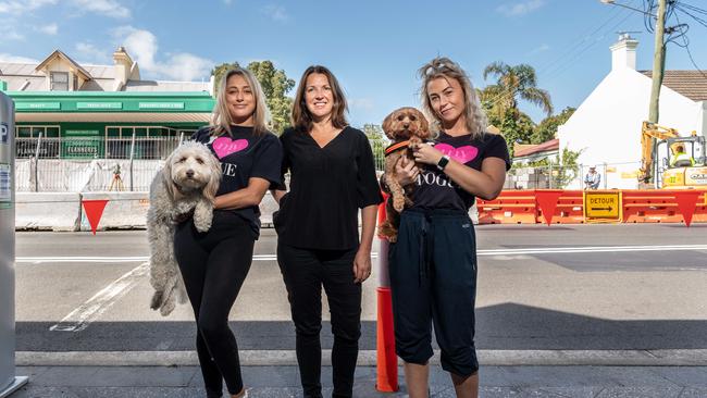 Emily Gangur holding Ziggy, Margaret Hennessy Dogue owner &amp; Sophie Clayton holding Hank pose for a photo outside Dogue Bondi. Picture / Monique Harmer