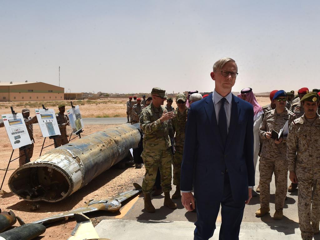 Brian Hook (R), the US special representative on Iran, checks what Saudi officials said were Iranian-made Houthi missiles and drones intercepted over Saudi territory. Picture: AFP