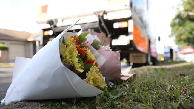 Flowers left on Waikanda Cres in Whalan near where a woman's body has been found after an explosion ripped through a suburban townhouse in Sydney's west. Picture: NewsWire / Damian Shaw