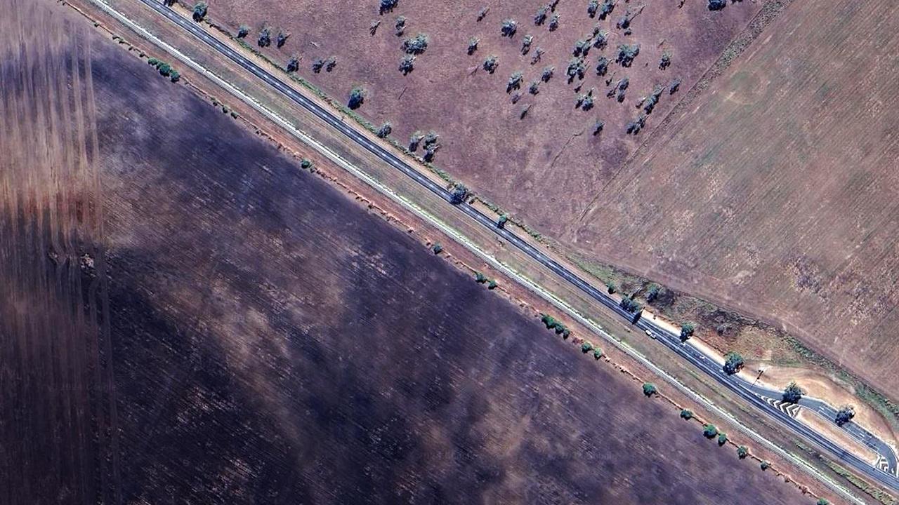An aerial view of the highway where the bus and caravan collided