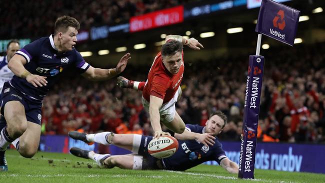 Steff Evans dives over for a second half try against Scotland at the Principality Stadium.