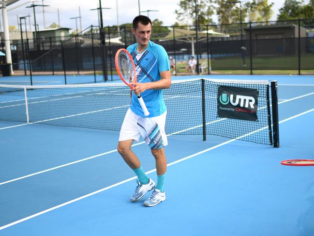 Bernard Tomic on the outside courts at the Queensland Tennis Centre. Picture: NCA NewsWire