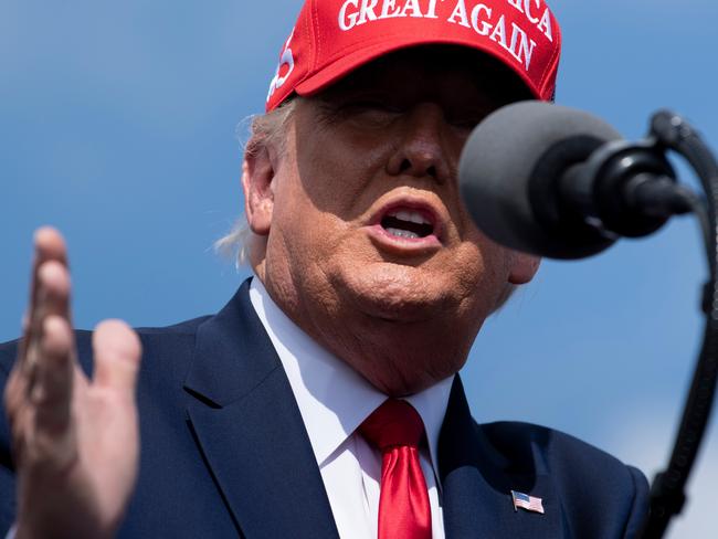 US President Donald Trump speaks at a "Make America Great Again" rally at Raymond James Stadium's parking lot on October 29, 2020, in Tampa, Florida. (Photo by Brendan Smialowski / AFP)