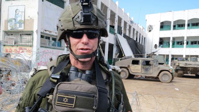 Lt Col Anshel standing outside a school that was used by Hamas terrorists as a stronghold. It was seized in December. Picture: Yoni Bashan