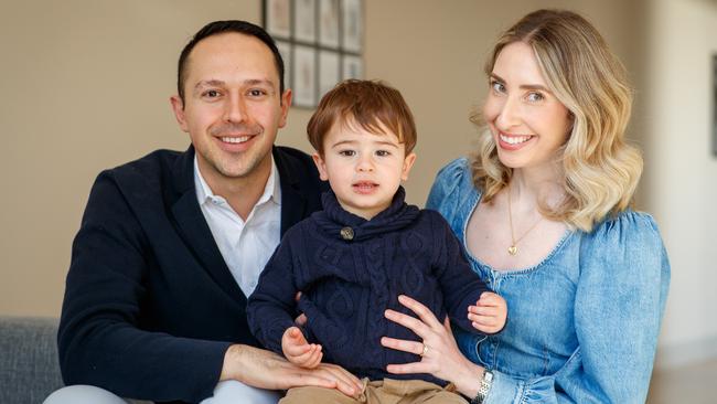 Arman Abrahimzadeh, his wife Genevieve and their son Raphael at home. Picture Matt Turner.