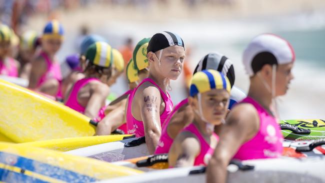 Competitors wait on the start line before an under-11 Male Board quarter-final at the NSW Surf Life Saving Championships at Blacksmiths Beach on Friday, 28 February, 2020. Picture: Troy Snook