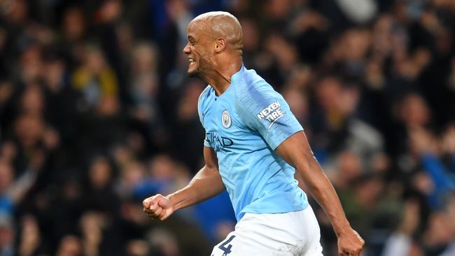 MANCHESTER, ENGLAND - MAY 06: Vincent Kompany of Manchester City celebrates after scoring his team's first goal during the Premier League match between Manchester City and Leicester City at Etihad Stadium on May 06, 2019 in Manchester, United Kingdom. (Photo by Michael Regan/Getty Images)