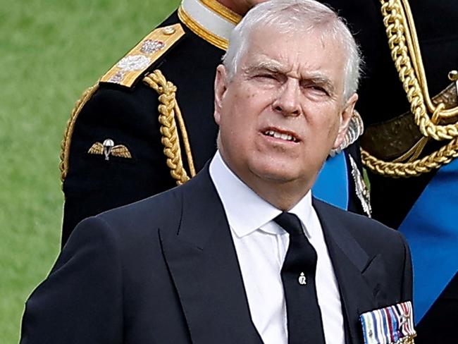 Britain's Prince Andrew, Duke of York (L), Britain's King Charles III (C) and Britain's Prince Edward, Earl of Wessex react ahead of the Committal Service for Britain's Queen Elizabeth II in St George's Chapel inside Windsor Castle on September 19, 2022. - Monday's committal service is expected to be attended by at least 800 people, most of whom will not have been at the earlier State Funeral at Westminster Abbey. (Photo by PETER NICHOLLS / POOL / AFP)