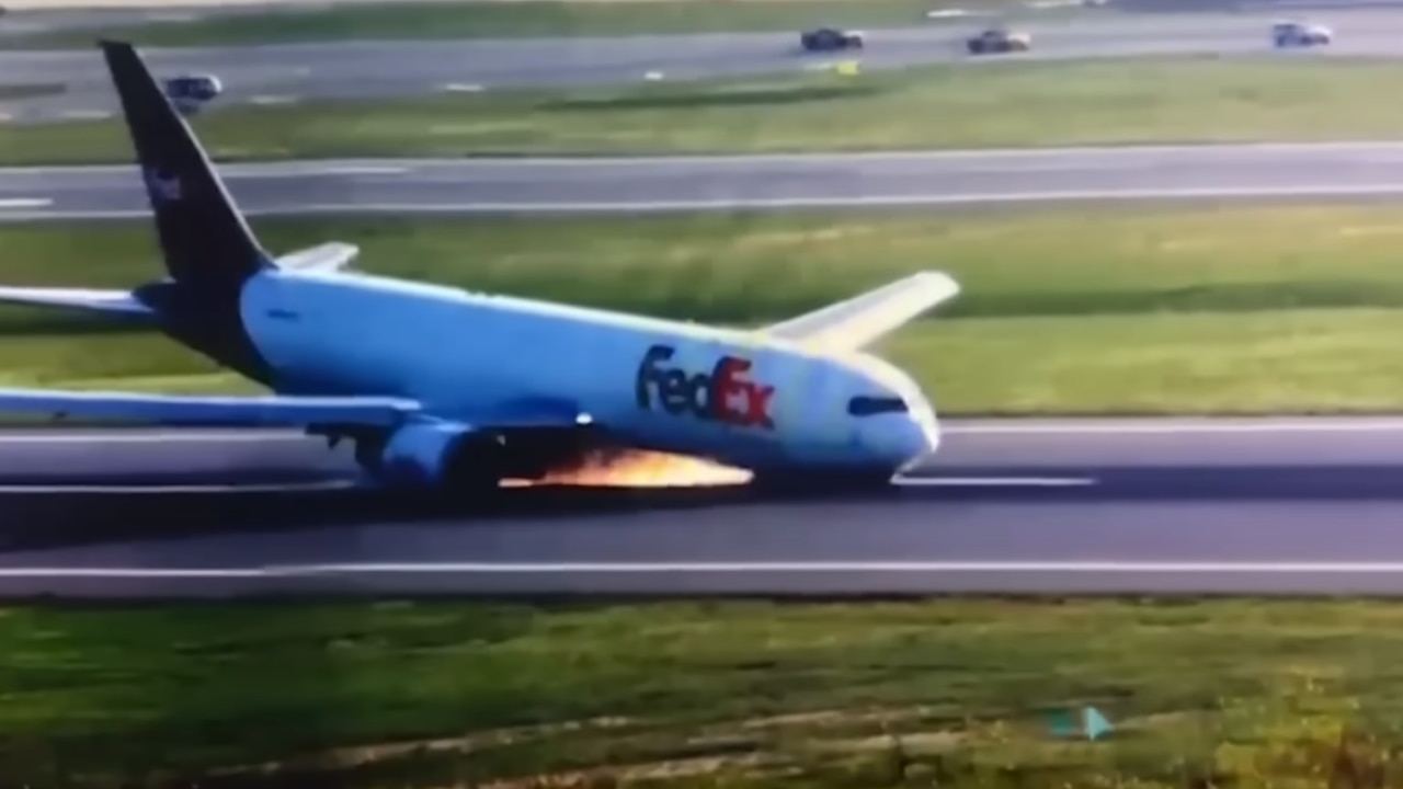 Boeing 767 cargo plane crash lands after landing gear fails to deploy ...