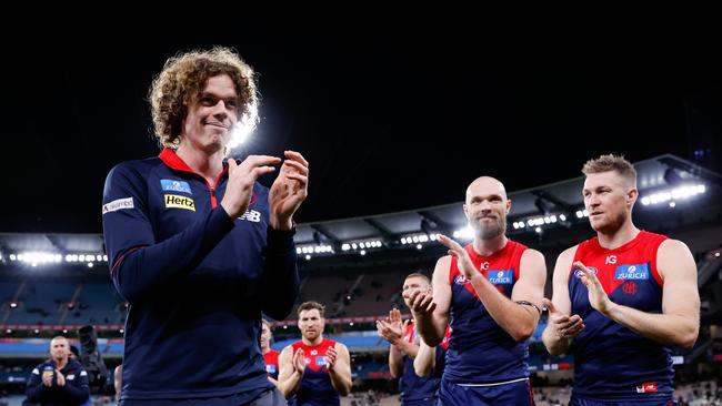 MELBOURNE, AUSTRALIA - AUGUST 23: The Demons form a guard of honour for retiree Ben Brown during the 2024 AFL Round 24 match between the Melbourne Demons and the Collingwood Magpies at The Melbourne Cricket Ground on August 23, 2024 in Melbourne, Australia. (Photo by Dylan Burns/AFL Photos via Getty Images)