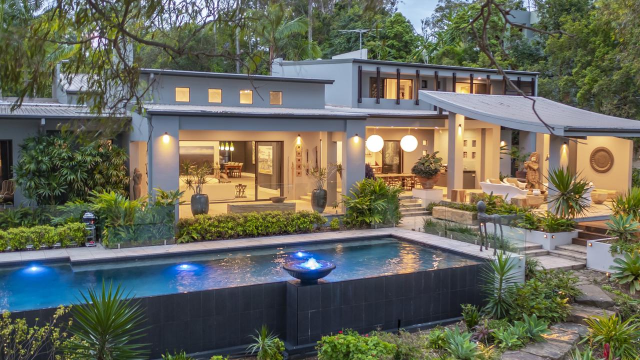 Power couple’s riverfront mansion set to smash Brisbane auction record
