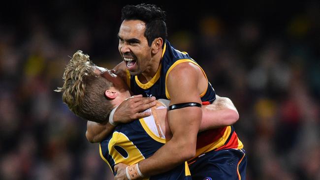 Eddie Betts celebrates with Rory Sloane after scoring a goal against the Saints at the Adelaide Oval in 2019. Picture: AAP/David Mariuz