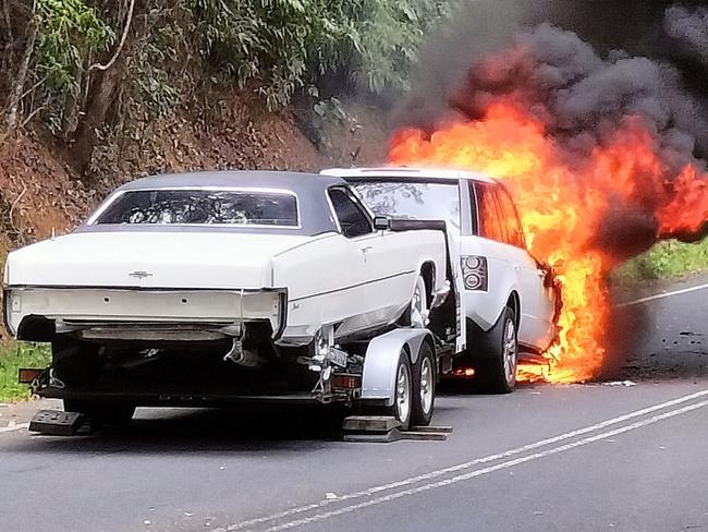 An SUV towing a trailer and vehicle on Mossman Mount Molloy Rd caught fire on December 28. Picture: Facebook