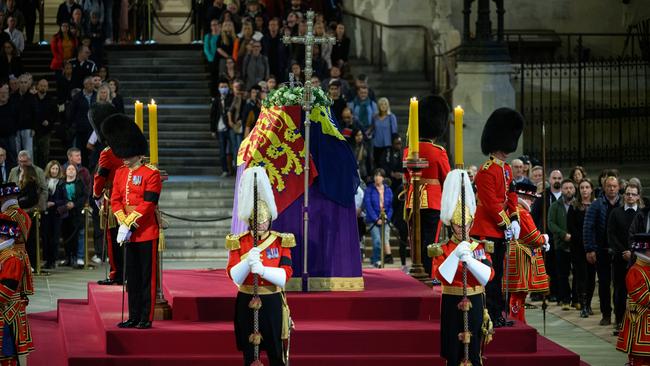 A man was arrested for trying to grab the flag from Her Majesty’s coffin as it Lay in State. Picture: Getty Images