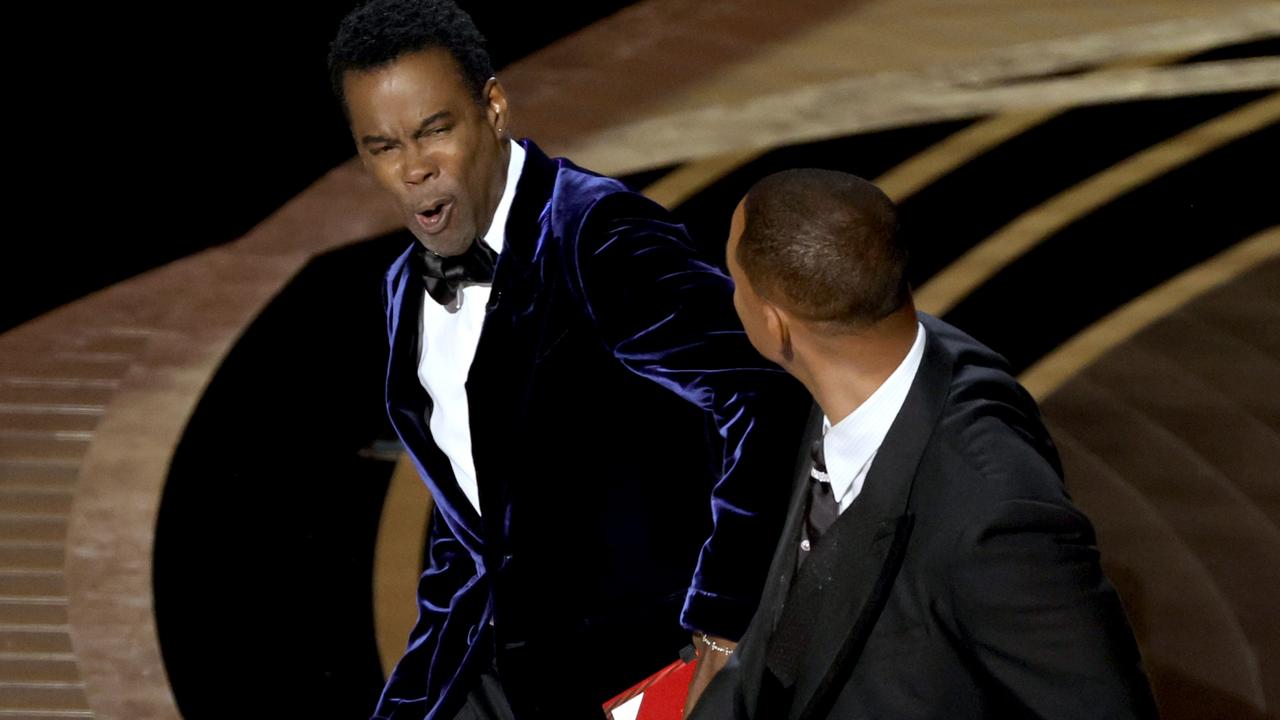 Chris Rock reacts after Will Smith slaps him. Picture: Neilson Barnard/Getty Images