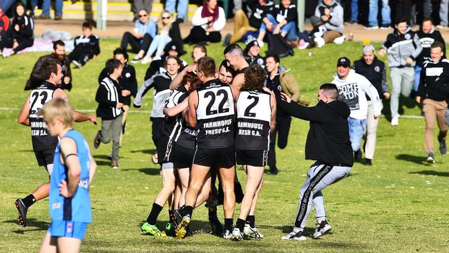 Daniel Nobes is mobbed by Waikerie fans and players after kicking his 100th goal. Picture: Grant Schwartzkopff