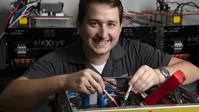 Engineer Dr Domagoj Leskarac working on an eleXsys voltage management device. Photo: AAP/Sarah Marshall