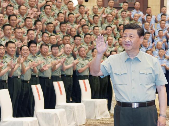 Chinese President Xi Jinping, also general secretary of the Communist Party of China Central Committee and chairman of the Central Military Commission, meets with military officers and troops stationed in northwest China's Xinjiang Uygur Autonomous Region, July 15, 2022. Xi made an inspection tour in Xinjiang from Tuesday to Friday. (Photo by Li Gang/Xinhua via Getty Images)