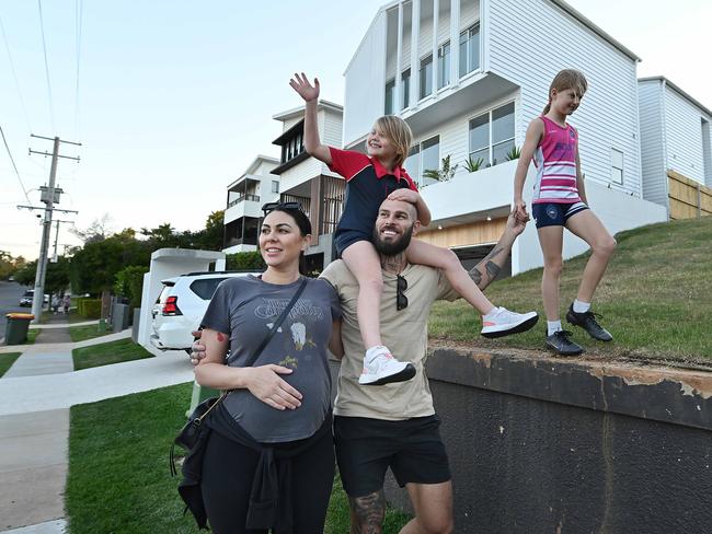 14/09/2021 : Cassie and Cameron Sawyer, with two of their 3 children, Peyton 9 snd Cami 7, at the home they built, that will settle tomorrow, in Clayfield, Brisbane,  .Lyndon Mechielsen/The Australian