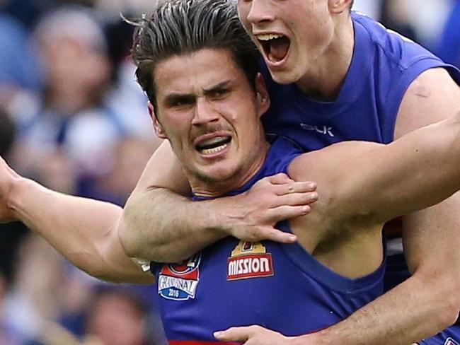 2016 AFL Grand Final match between the Western Bulldogs and the Sydney Swans at the Melbourne Cricket Ground (MCG), Melbourne, Australia on October 1, 2016. Tom Boyd kicks a goal & Toby McLean Picture :Wayne Ludbey