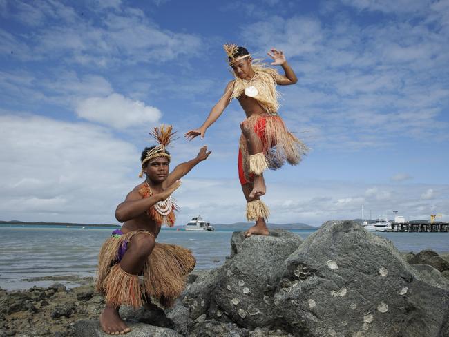 Local dancers Samaka Laifoo and Kunio Sagigi perform on Thursday Island as part of the inaugural Strait Experience. Picture Lachie Millard