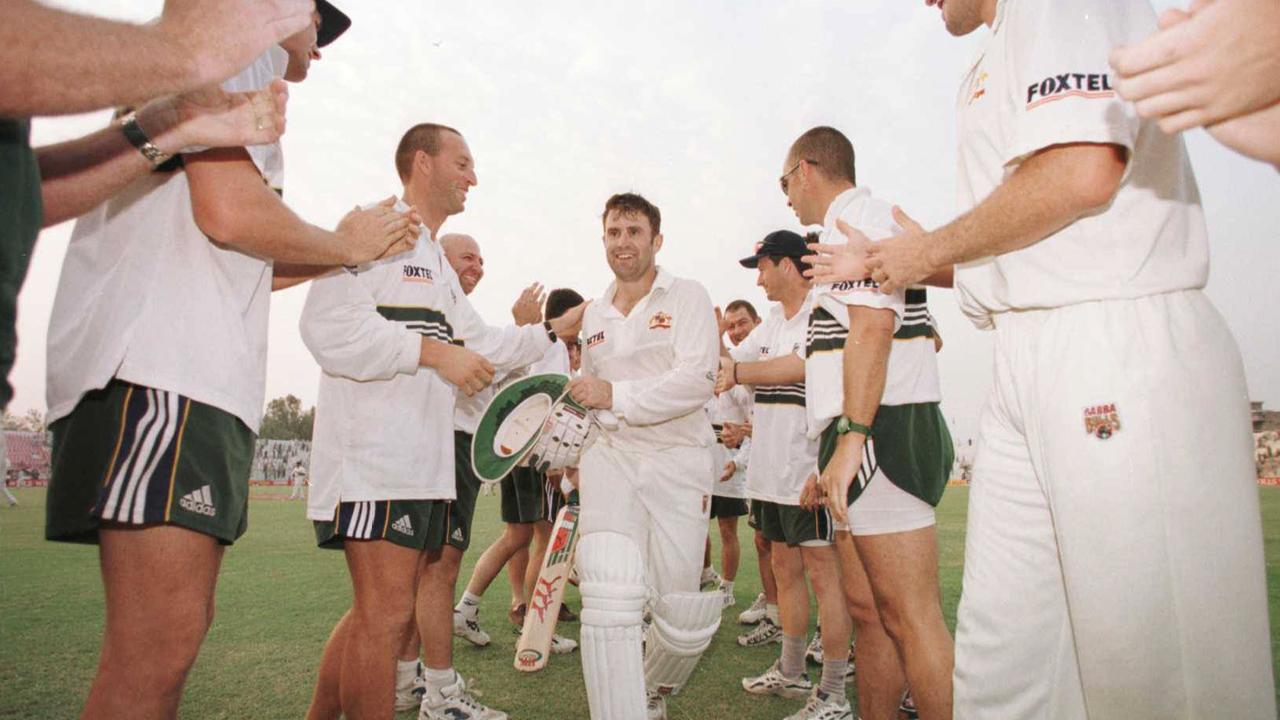 Mark Taylor is congratulated by his teammates after his epic knock in Pakistan.