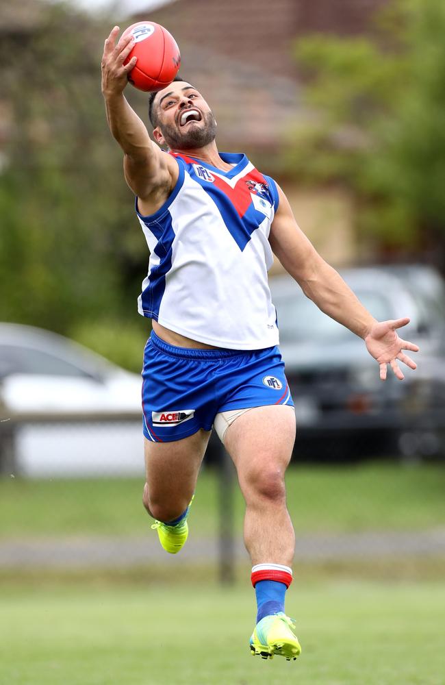 Ali Fahour marks during an NFL football match between West Preston-Lakeside and Heidelberg in April. Picture: Mark Dadswell