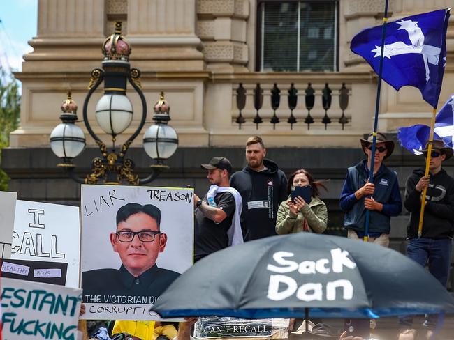 Marchers brought anti-Daniel Andrews signage. Picture: Ian Currie