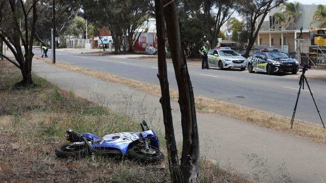 Police at scene of the motorcyclist crash on Maxwell Road Pooraka. Picture: Dean Martin/AAP