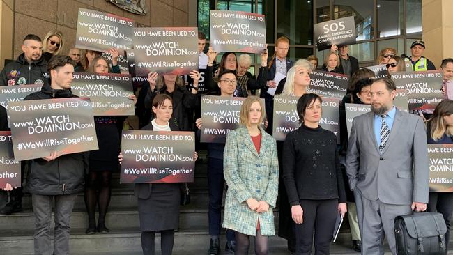 Activists are seen outside Melbourne Magistrates Court today. Picture: Georgie Moore/AAP