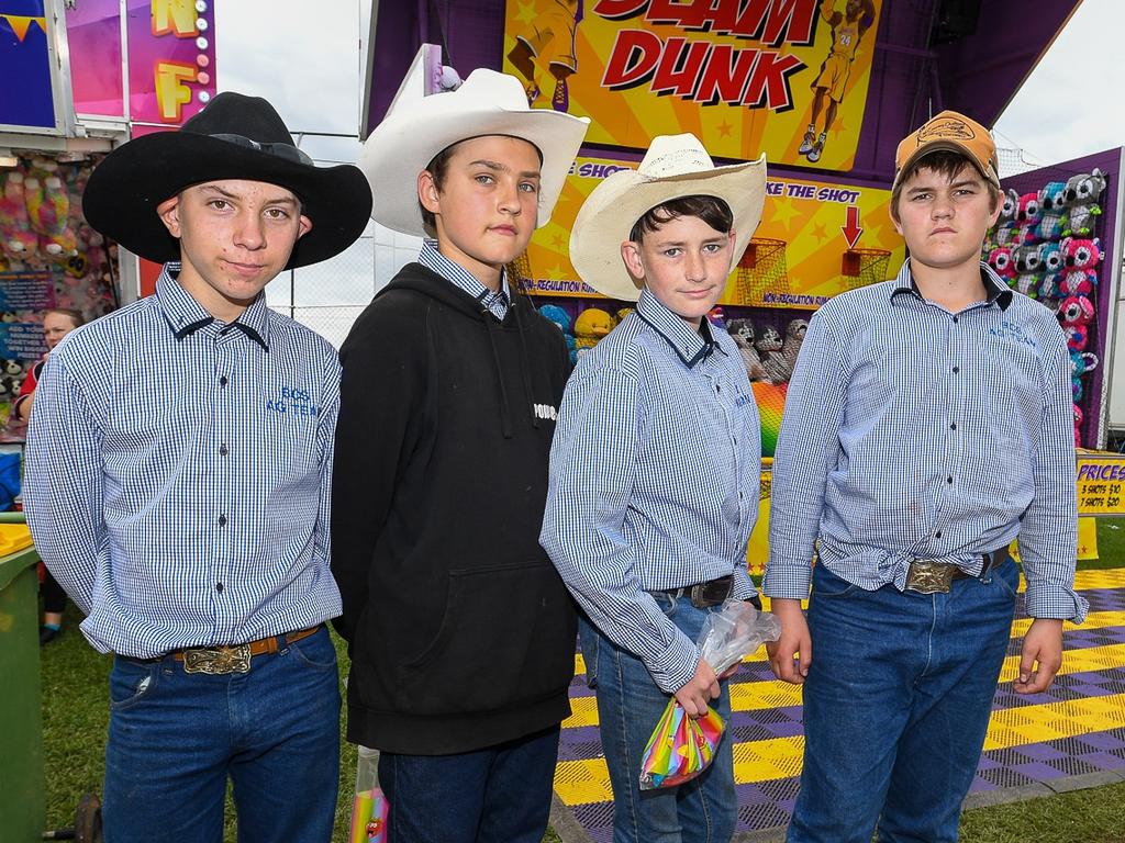 Layne Whittaker, Jason James, Loclin Smith and Tyrone Redden shooting hoops in sideshow alley at the Lismore Show. Picture: Cath Piltz