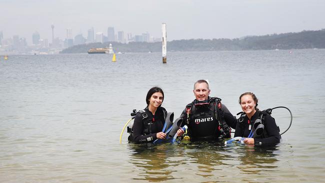 Divers off Camp Cove where the water is calm and clear.