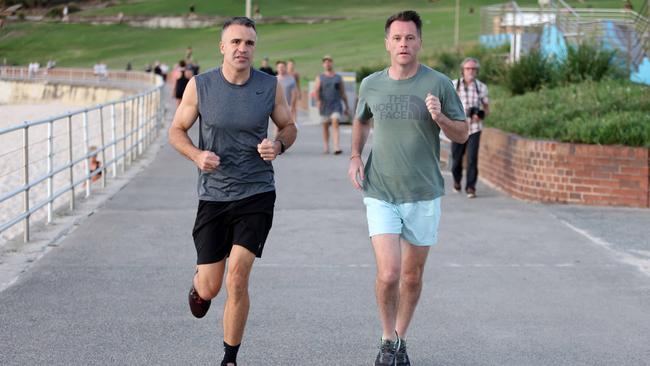 Malinauskas wore a seeveless running singlet, Minns a more ­demure sleeved tee. Picture: NCA NewsWire / Damian Shaw