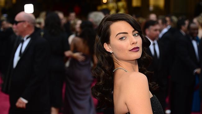 Margot Robbie stuns on the red carpet with a fierce new look. 