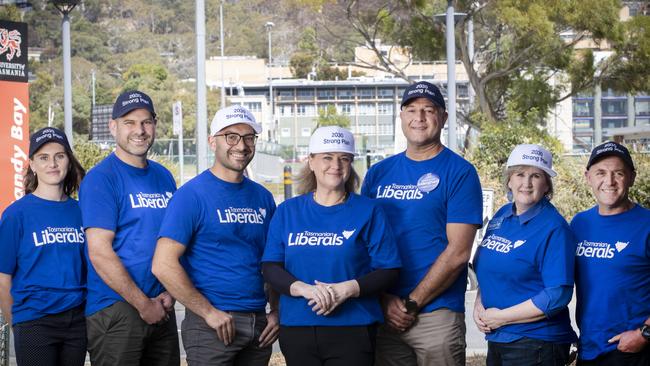 Liberal Clark, candidates (L-R) Emma Atterbury, Jon Gourlay, Simon Behrakis MP, Madeleine Ogilvie MP, Mohammad Aldergham, Catherine Searle and Marcus Vermey outside the Sandy Bay UTAS Campus. Picture: Chris Kidd