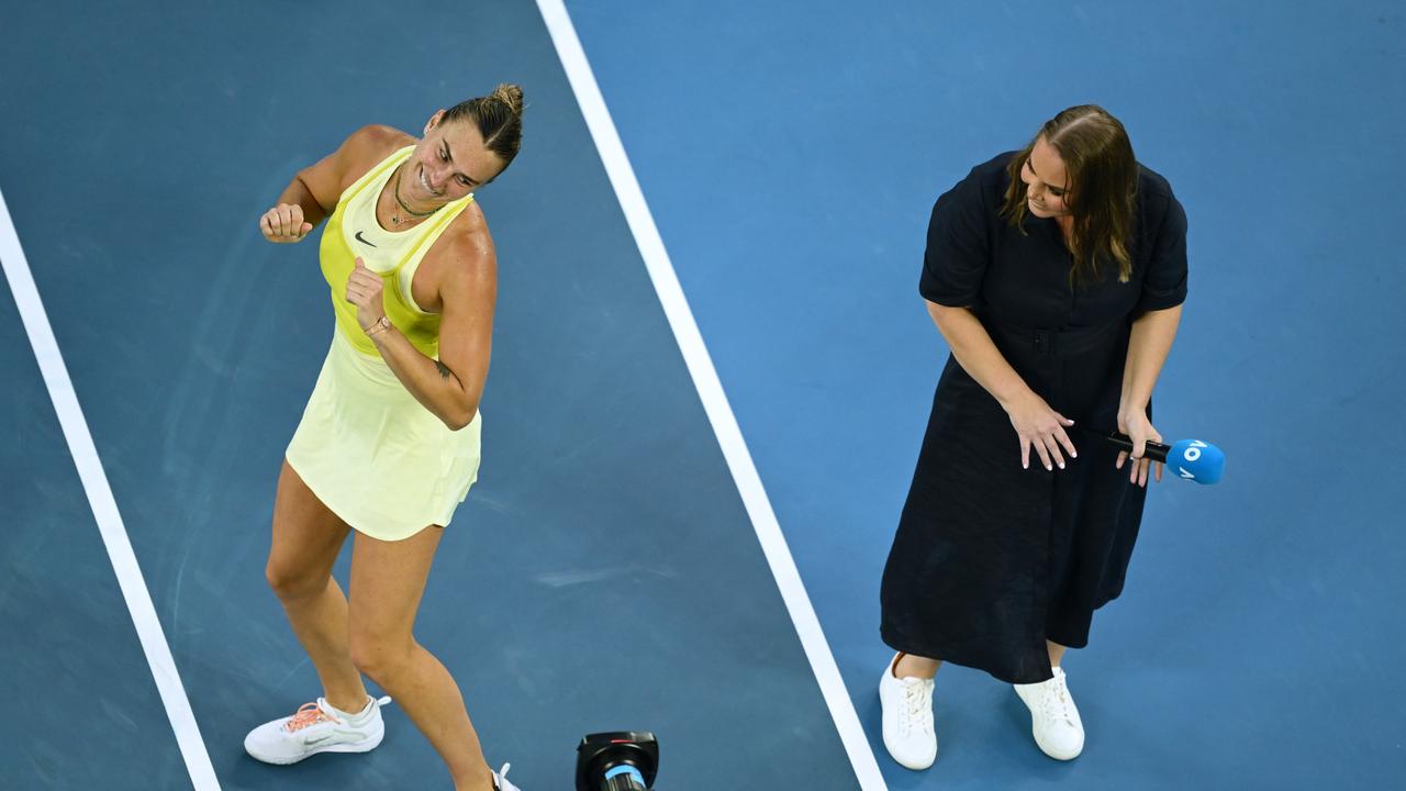 Dokic interviewing – and dancing with – Aryna Sabalenka at this year’s Australian Open. (Photo by Hannah Peters/Getty Images)