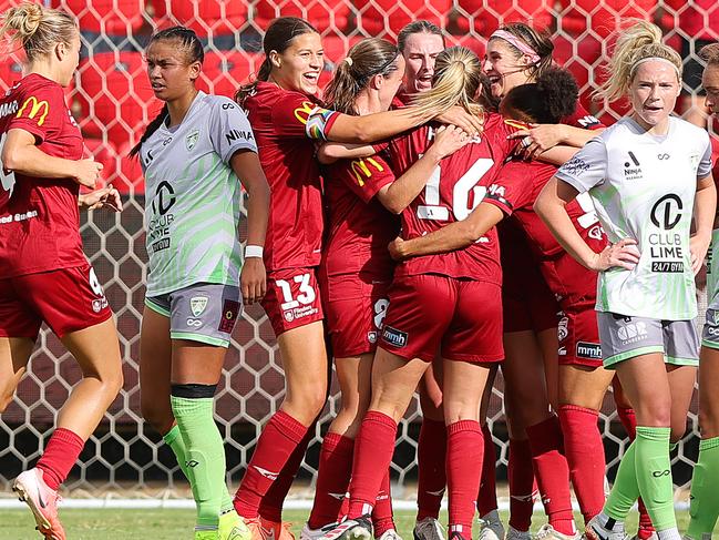 Adelaide United celebrating a goal against Canberra United in February. Picture: Sarah Reed/Getty Images