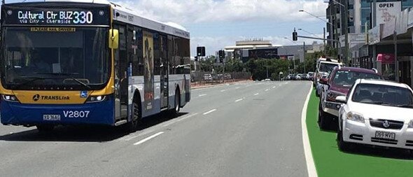 An artist's impression of the 24/7 Northern Transitway along Gympie Rd where parking will be banned. This bus, though, had no issues getting through traffic, even without a bus lane, and business owners fear their livelihoods will be lost if parking is wiped out. Pic: Darren Cartwright
